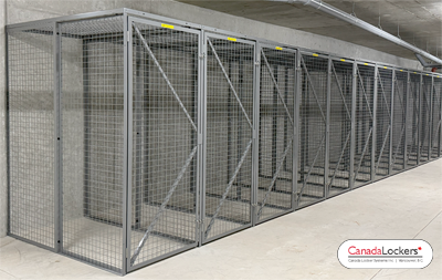 A set of wire mesh storage lockers being used as bicycle lockers. These 7' tall bike lockers allow the user to fully walk into the locker while parking their bike.