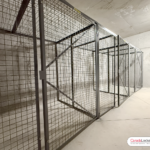 Extra-large wire mesh storage lockers installed in a parkade storage room. These 7-foot tall storage lockers provide ample room to store large items.