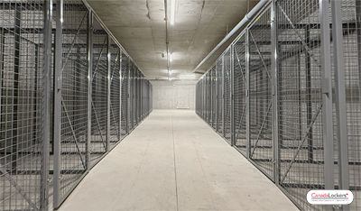 A room of wire mesh storage lockers.