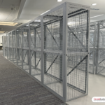 The back of each equipment locker is enclosed with a welded mesh panel.