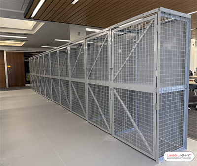 A bank of equipment storage lockers. Each locker has a sturdy shelf and a single door.