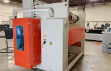 Rear view of a 125 ton press brake in our bending work station. This machine is used to form bike locker frames and accessory brackets.